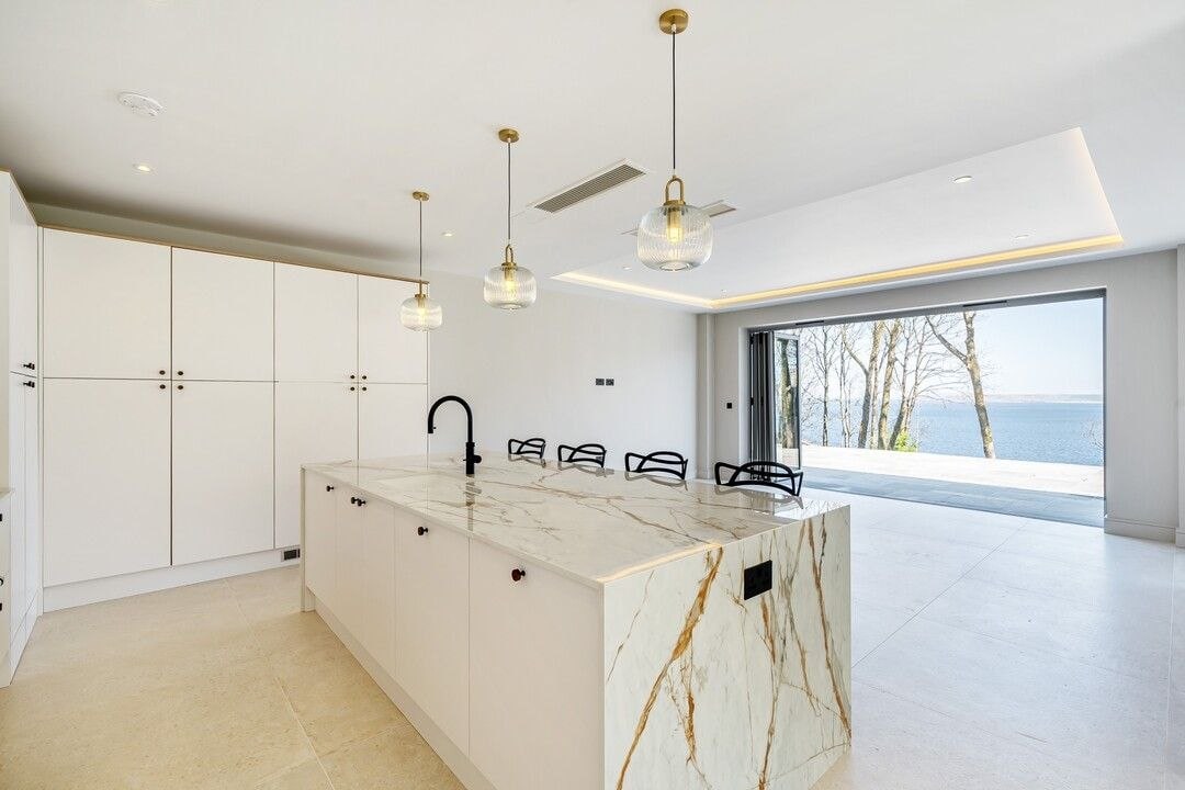 Luxury holiday let kitchen with sea view and marble island